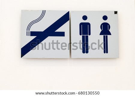 Non-smoking sign with male and female toilets