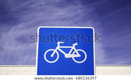 Traffic sign for bicycles and cyclists, detail of caution signal and information