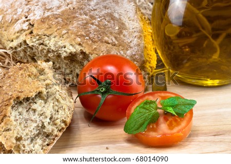 Fork with slice tomato and bread