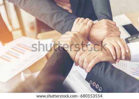 Mission vision business corporate team building corporate teamwork industry job.Mission strategy for start up business people holding hands fist bump together. Leadership Mission vision values Concept Royalty-Free Stock Photo #680153554