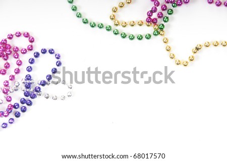 collection of colorful mardi gras beads