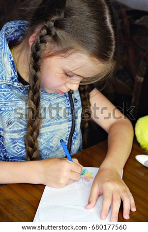 the child draws a picture