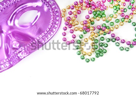 Mardi gras mask and beads