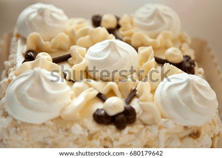 white meringue cake on white background