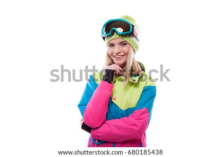 isolated on white, attractive  young caucasian girl in colorful ski suit, hand on face, look at camera