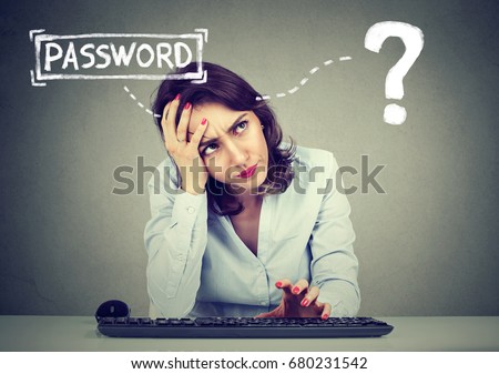 Desperate young woman trying to log into her computer forgot password   Royalty-Free Stock Photo #680231542