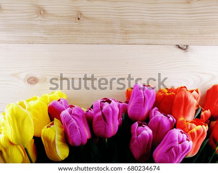 beautiful tulip bouquet on wooden background copy space