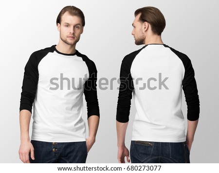 White baseball t-shirt with black tucked sleeves on a young man in jeans, isolated, front and back, mockup.