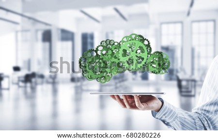 Close of businessman presenting tablet pc and cloud computing concept. Mixed media