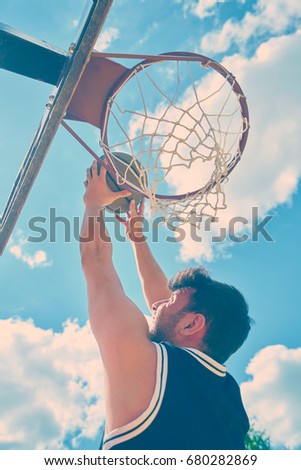 Basketball player dunk