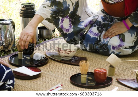 Japanese women making sado chanoyu or Japanese tea ceremony, also called the Way of tea at outdoor in Nakhon Ratchasima, Thailand Royalty-Free Stock Photo #680303716