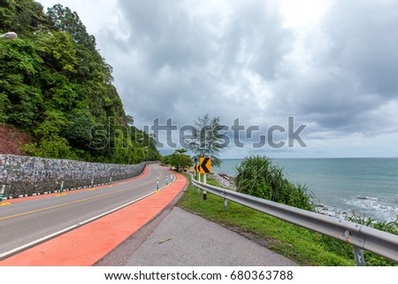  Beautiful peaceful seafront road in Chanthaburi thailand,with the red Bicycle path