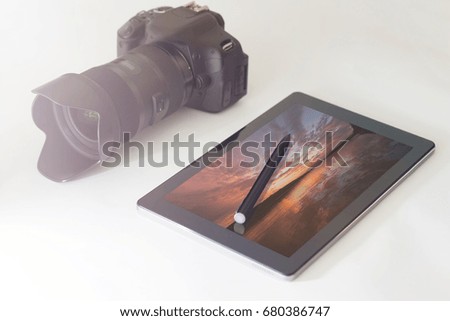 Sunset photography concept, DSLR, digital tablet