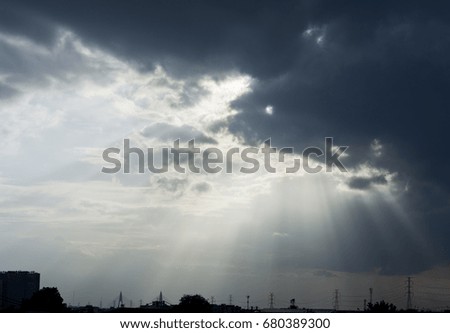 Ray of sunlight shining through the dark cloud. Concept of Hope, Inspiration.