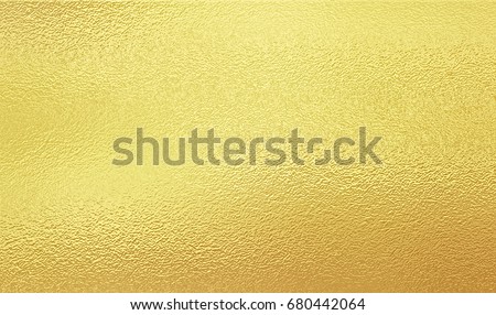 Shining gold foil. Yellow metallik texture background.