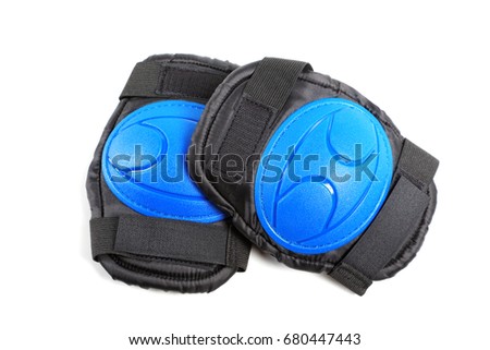 Knee pads and elbow pads isolated on white background Royalty-Free Stock Photo #680447443