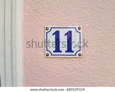 number 11 House number on the wall eleven 