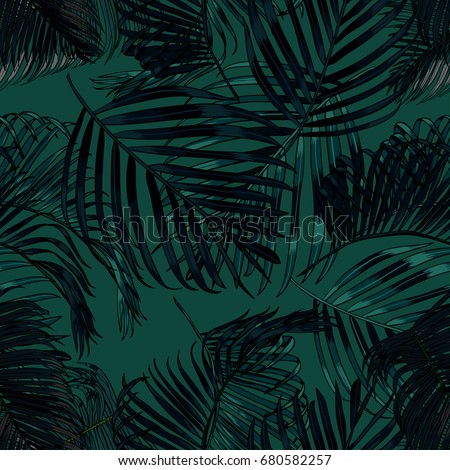 Palm leaves silhouette on the green background. Vector seamless pattern with tropical plants.