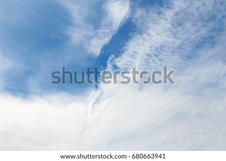 Blue sky with fluffy white clouds