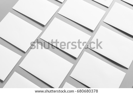 Blank portrait A4. brochure magazine isolated on gray, changeable background / white paper isolated on gray Royalty-Free Stock Photo #680680378