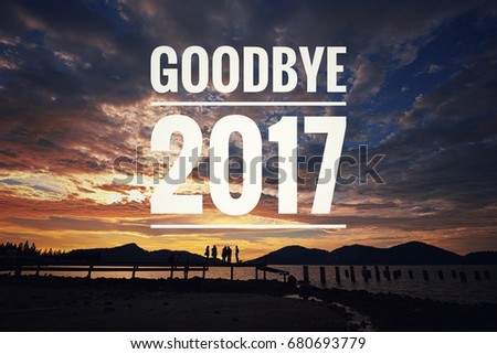 Goodbye 2017 written on the seascape sunset background