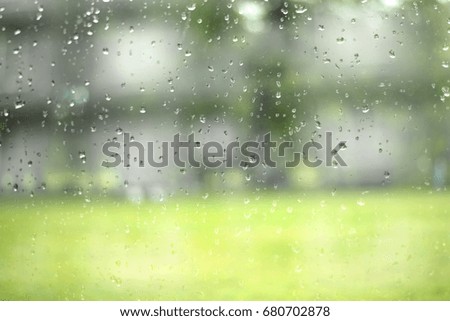 Glass with natural water drops. Abstract background.