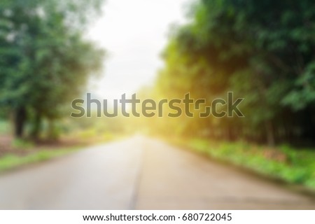 Abstract blurry picture of the road directly to the forest, at the mountain Isan (Northeast Thailand)
