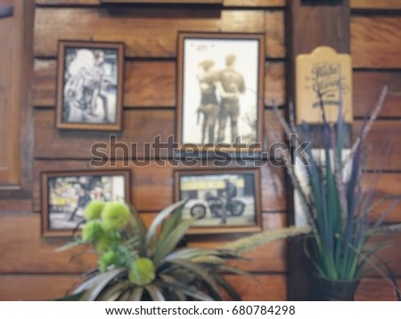 Blurred background of Old wooden wall decorated with picture Strip Vintage atmosphere in a coffee shop