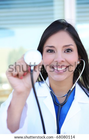A young pretty woman nurse with stethoscope at hospital