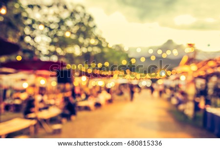 abstract blur image of  night festival in garden with bokeh for background usage.