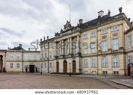 Amalienborg Palace (1760) - home of the Danish royal family. Royal Palace consists of four identical classical palace facades. Copenhagen, Denmark.