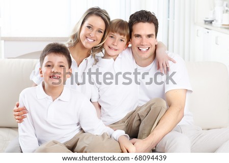 Happy family. Father, mother and children at home