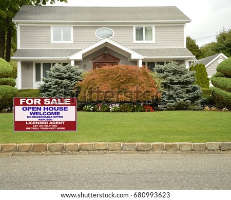 Real Estate For Sale sign front yard lawn suburban four square style house USA
