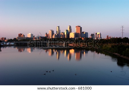 Minneapolis skyline reflecting in the Mississippi River.
