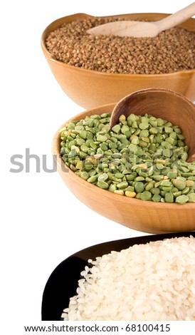 rice, pea and buckwheat in plate isolated on white background