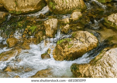 Mountain stream with stones in forest - Cheile Bicazului, Transylvania, Romania