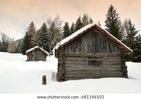 Alpin Hut in the Dolomites. Winter in Val Pusteria, near Brunico. Italy.