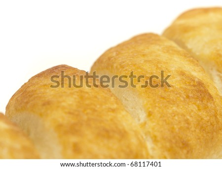 closeup of a sweet bun on a white background