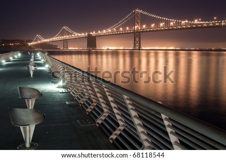 Bay Bridge at Night from pier in San Francisco