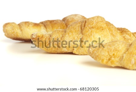 sweet croissant isolated on a white background