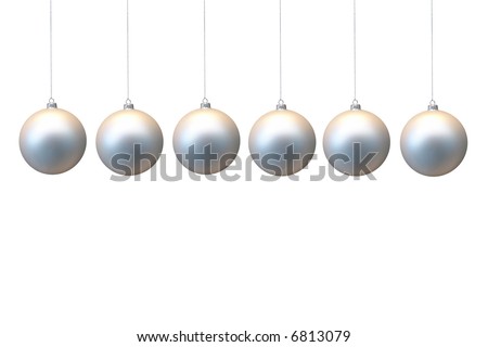 Row of silver christmas balls hanging on strings over white background