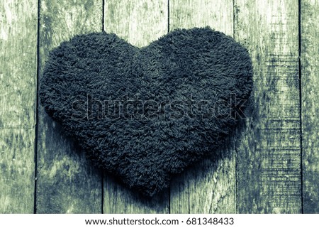 Heart on wood background,Love concept