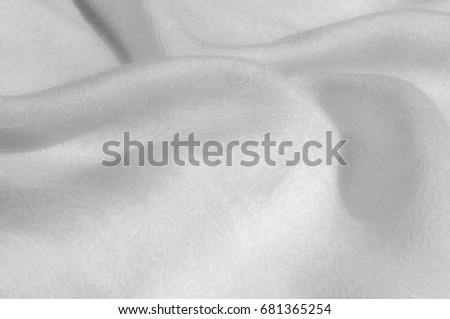Texture, background, pattern. Fabric - silk light. Italian white fabric with white tones is a small floral pattern. Solid Silk Charmeuse fabric - light silver lining