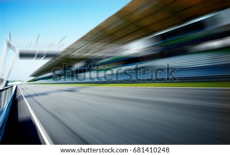 Racetrack in motion blur, racing sport background .