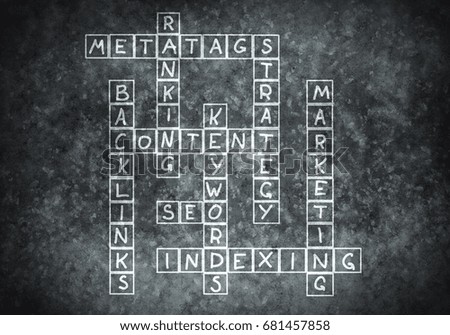 Studying concept with crossword drawn on blackboard