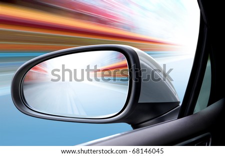speed car driving at high speed on empty road - motion blur Royalty-Free Stock Photo #68146045