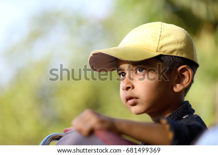 Indian child in cap