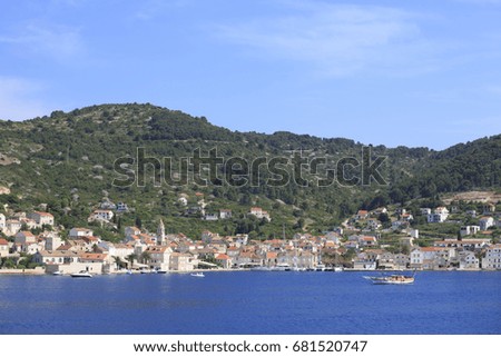 Small town with stone houses by the sea, Photo of town by the sea in summer
