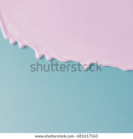Abstract pink oil paint texture on blue canvas. Minimalistic background with copy space. Royalty-Free Stock Photo #681617563