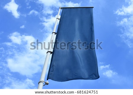 Vertical hanging blue fabric banner flag